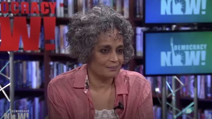 Arundhati-Roy-speaking-to-Democracy-Now.jpg